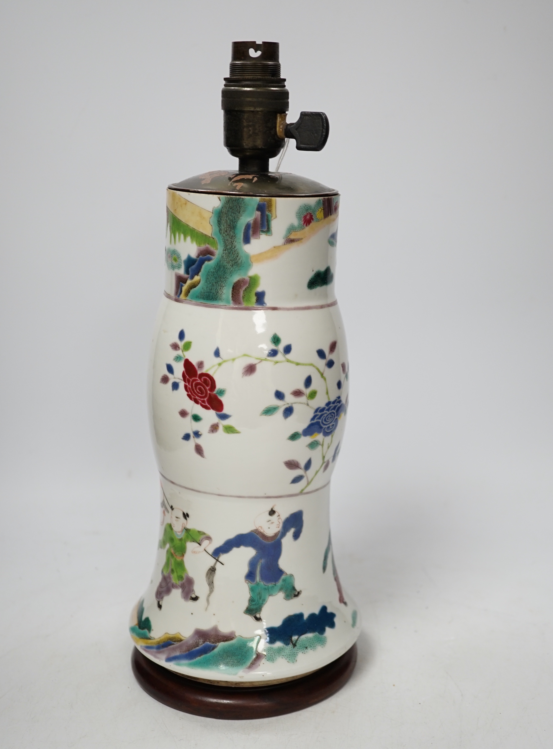 An early 19th century Chinese famille rose gu vase, converted to a lamp, reduced, apocryphal Kangxi mark, overall 35cm high